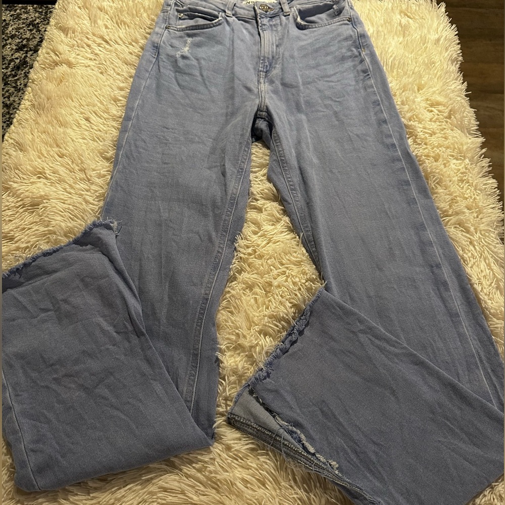 Zara flared jeans with rip at bottom